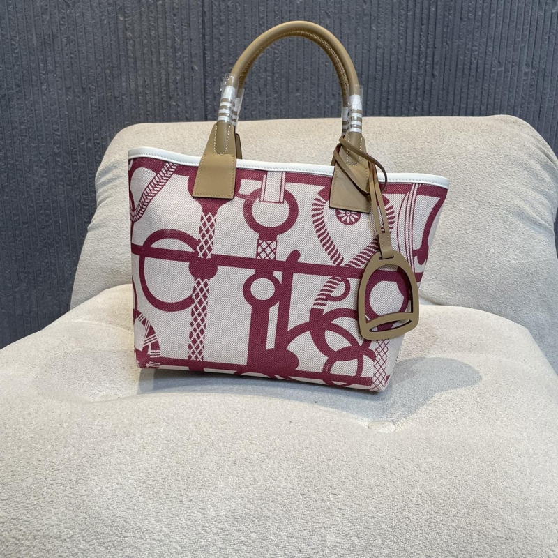 H**mes shopping bags